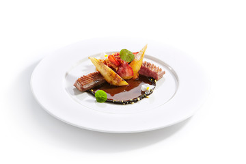 Duck Breast with Stewed Pear, Flowers and Strawberries Isolated
