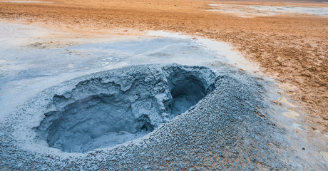 Bubbling geothermal hot/mud pool in the Hverarond area near Myvatn in the Icelandic landscape....