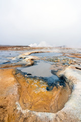 Vertical shot of Colorful and textured volcanic ground in geothermal area in Icelandic scenery...
