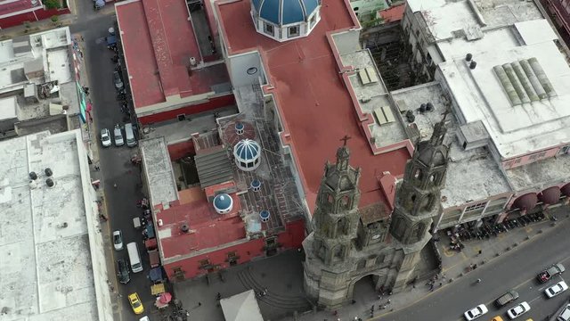 Tepic Cathedral in city centre of Tepic. State Nayarit in Mexico. Catedral de la Purísima Concepción. Aerial drone view, tilt 4K.