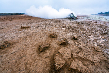 Hot sulfuric steam vent spewing sulphur steam in the hot sulfuric and geothermal area of Namaskard...