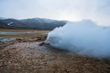Hot sulfuric steam vent spewing sulphur steam in the hot sulfuric and geothermal area of Namaskard...