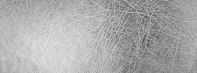 close up shot of bright silver leather texture for banner background
