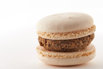 Chocolate macaroon on white background 