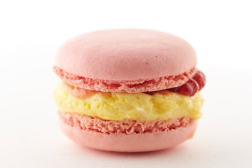 Strawberry macaroon on white background 