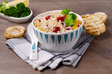 Warm pearl salad with vegetables