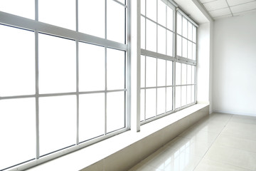 Fototapeta na wymiar Big modern metal-plastic window in room