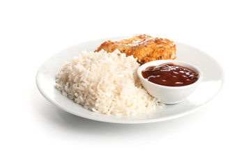 Plate with tasty rice and chicken on white background