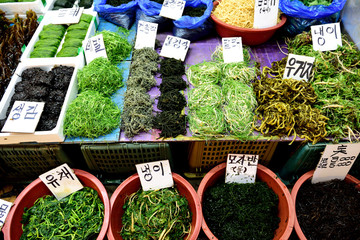 Various freshly harvested raw seaweed sea plants in a fresh seafood market, Seoul, South Korea