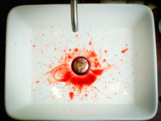  Blood dripping into the washbasin in the bathroom