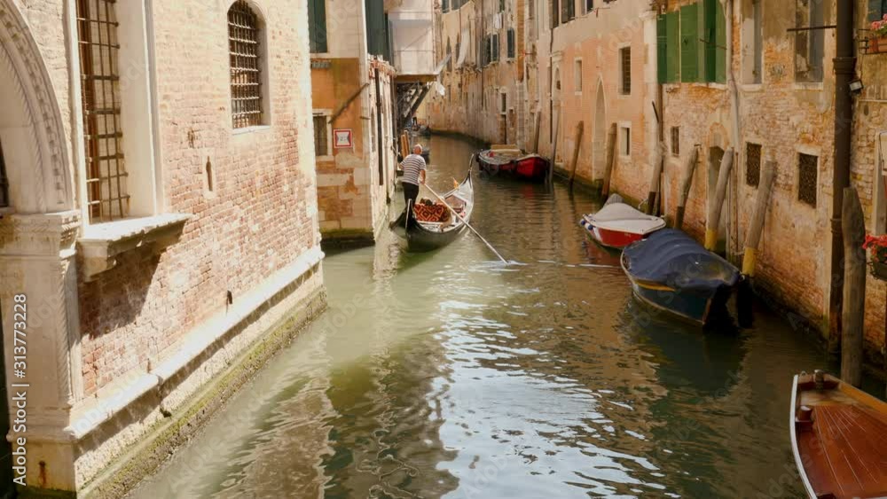 Wall mural venice, canal and gondola in italy