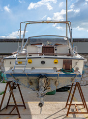 Small motor boat under maintenance