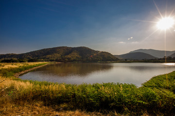 Blurred abstract background of nature, panoramic views in natural marshes, with small boats (kayaks) for fish to survive, with clear skies during the day
