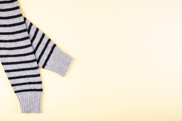 Textile, shirt composition on color background. Flat lay.