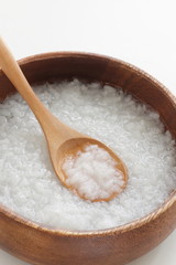 Chinese food, healthy rice congee in wooden bowl