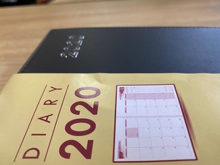 Diary book of year 2020 on the table