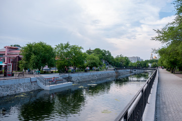 Fototapeta premium Russia, Blagoveshchensk, July 2019: river pond in friendship Park in Blagoveshchensk in summer