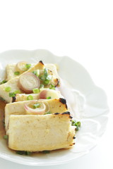Pan fried tofu and scallion with soy sauce for healthy food image
