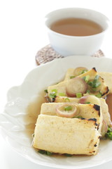 Pan fried tofu and scallion with soy sauce for healthy food image