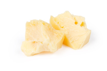 Two broken pieces of the hard cheese on white background