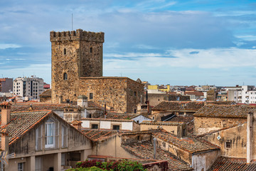 Alleys with old stone buildings at Caceres, Extremadura, Spain.