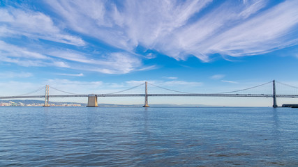 San Francisco, the Embarcadero, the Oakland Bay Bridge at sunset, panorama 