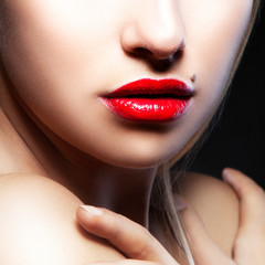 Red lips, bright lipstick, beauty woman face close-up, perfect skin