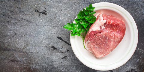 raw meat, a piece of pork (healthy eating) menu concept. food background. top view. copy space