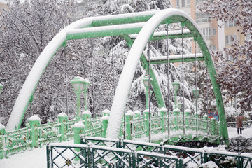Lovely Green Steel Bridge is under snow after snowfall in Eskisehir, Turkey.