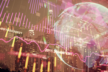 Double exposure of forex chart drawings over cityscape background. Concept of success.