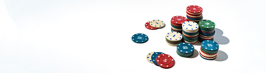 the simple abstract stack of casino chips on the color surface table with copy space