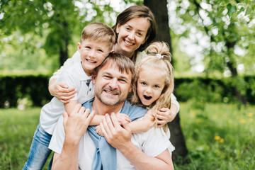 Portrait of a happy family at the picnic.