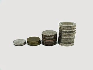 Pile of Thailand coins money on isolated white background. Money, Financial, Business growth concept.