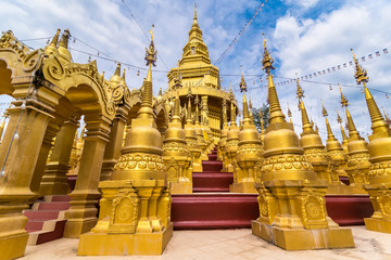 Naklejka premium Saraburi , Thailand - January, 2, 2020 : Golden pagoda at Wat pa sawang boon temple , Saraburi , Thailand