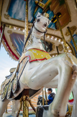 Novi Sad, Serbia - December 13. 2019: Downtown Novi Sad. The decorations on the children's carousel with wooden horses