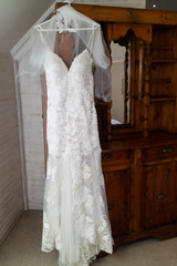 Fototapeta na wymiar A bride's white wedding dress