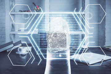 Computer on desktop in office with finger print drawing. Double exposure. Concept of business data security.