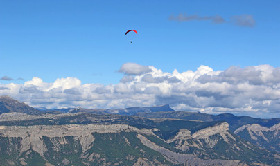 Paraglider flying in the French Alps	