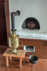 Old russian samovar and old russian stove