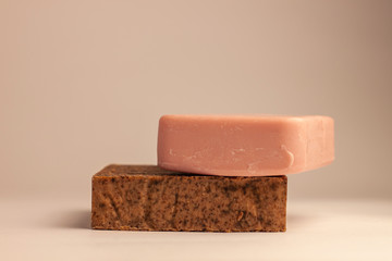 Natural coffee with cinnamon and berry soap on white background. Eco coffee scrub, spa skin care. Vegan beauty treatment,removal old skin cells.Unscented soap bar for cleansing exfoliating,handcrafted