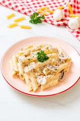penne pasta carbonara cream sauce with mushroom