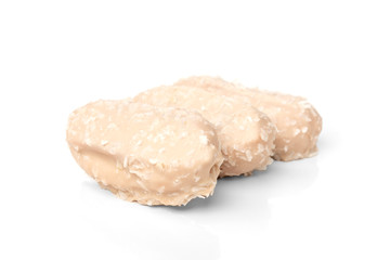 Coconut eclairs or custard cookies isolated on white background.