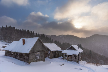 A charming evening with beautiful sky and mountain houses in the Ukrainian Carpathians