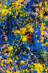 abstract expressonism. Picture painted using the technique of dripping. Mixing different colors red yellow blue white black. Vertcal orientation.