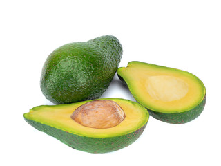 Avocado and avocado halfs isolated on a white background.