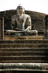 Sitting Buddha in the Vatadage of the royal ancient city of Polonnaruwa in Sri Lanka