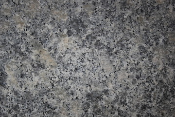 Closeup of the texture of a stone block.