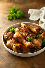 Roasted chicken drumsticks with fresh parsley