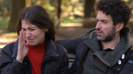 young woman disgusting because her boyfriend has bad breath