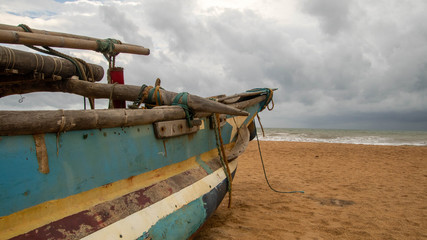 Stranded boat facing storm (Negombo, Sri Lanka)